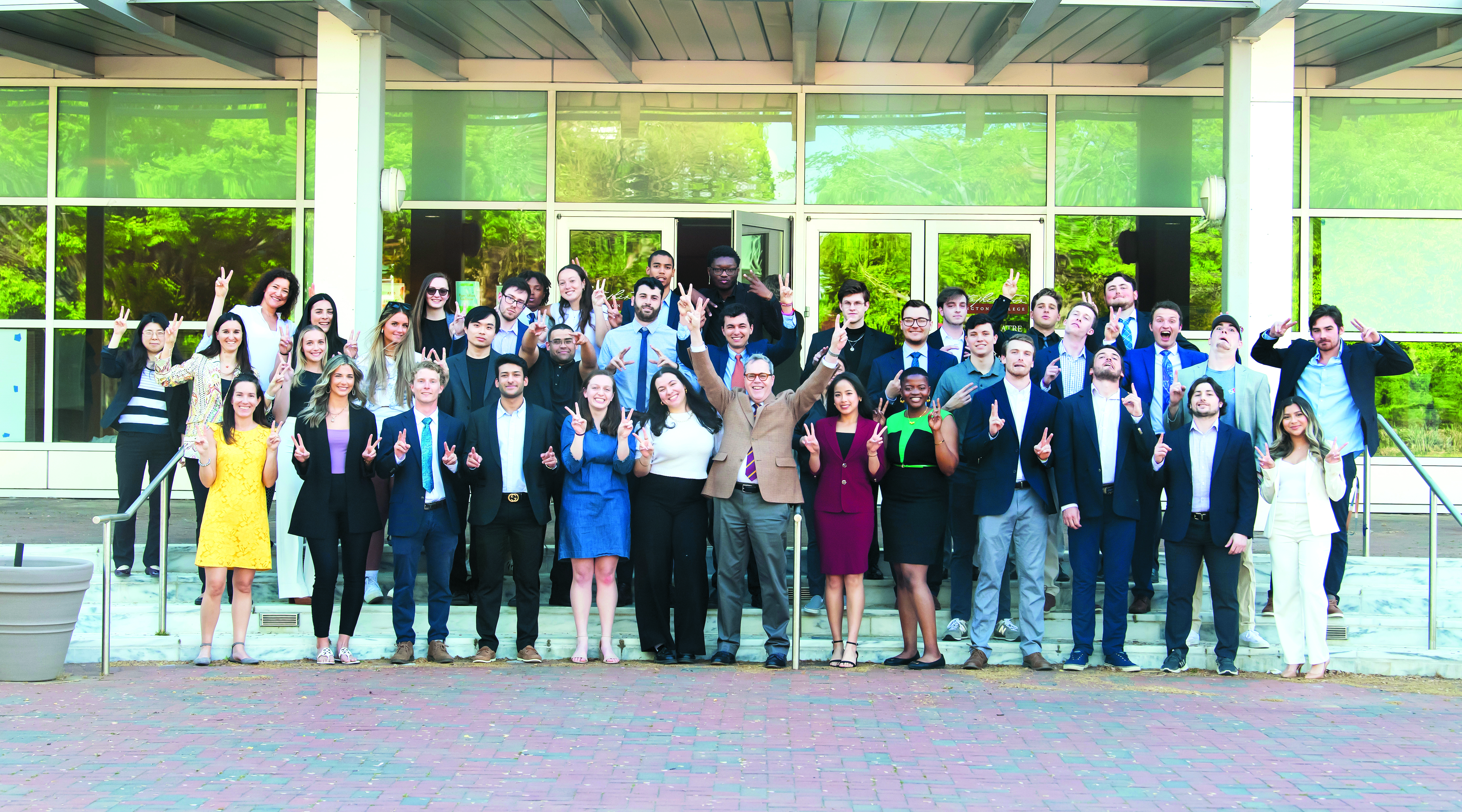 Mike Sosulski and students on the steps of Gibson Center for the Arts