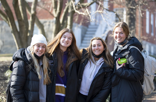 A group of students pose for a picture on campus