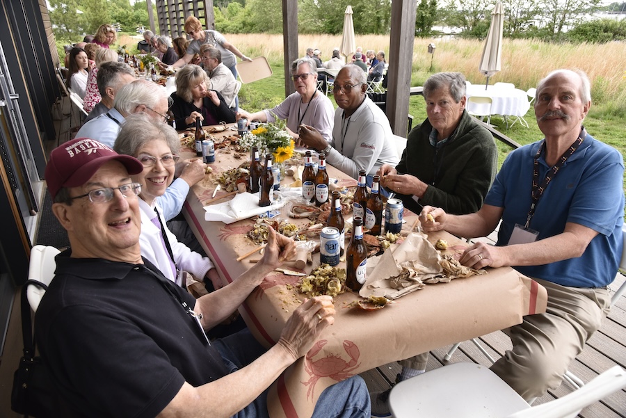 alumni at a picnic table