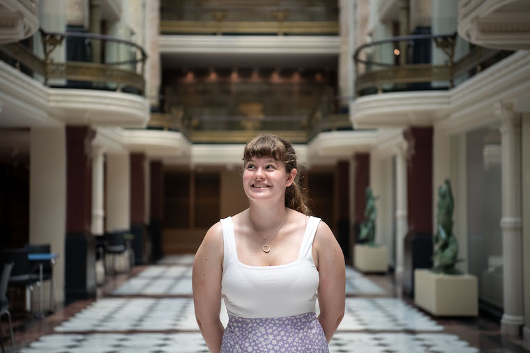 A Washington College student intern poses in a DC museum. 