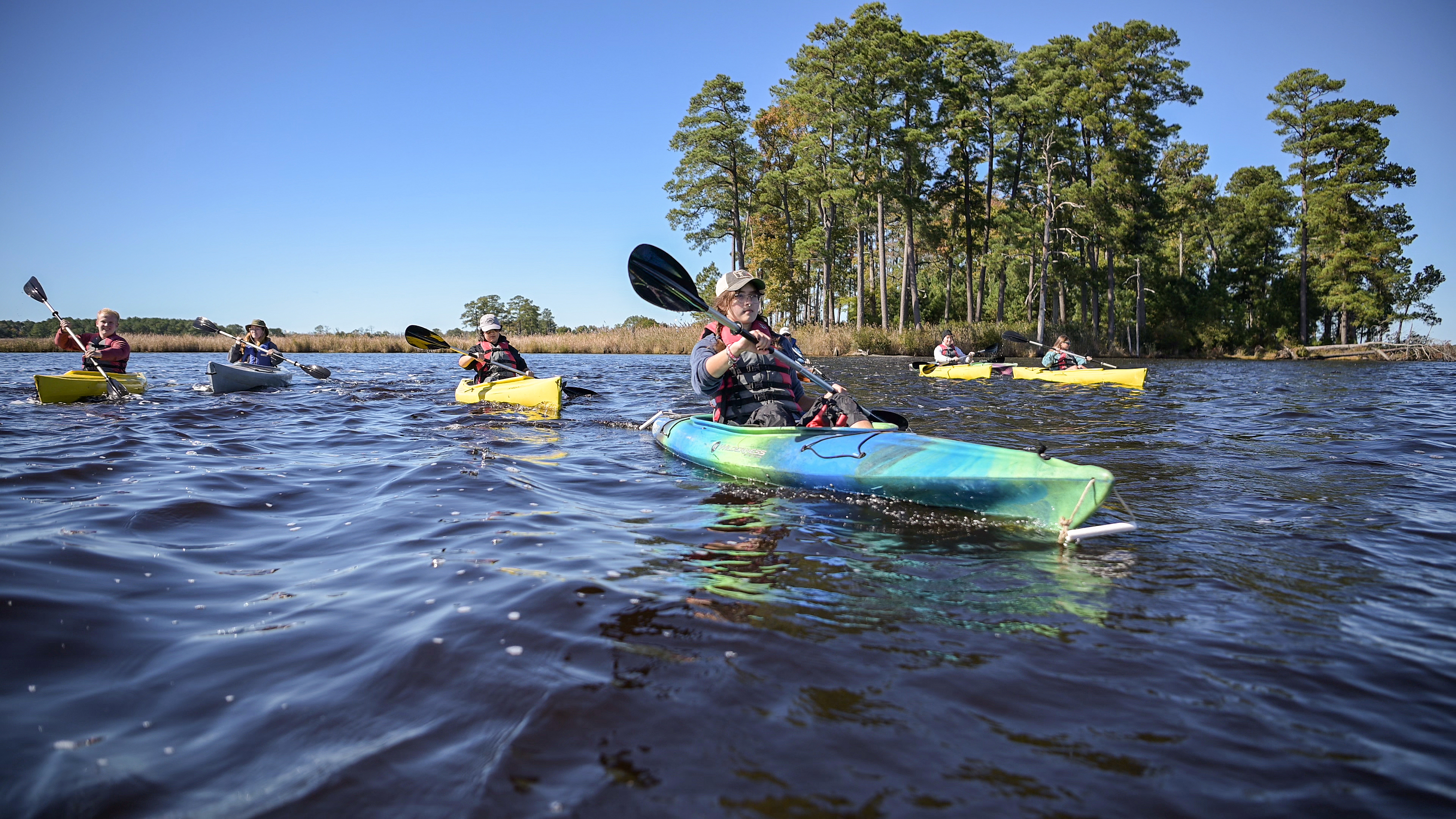 group of people kyaking